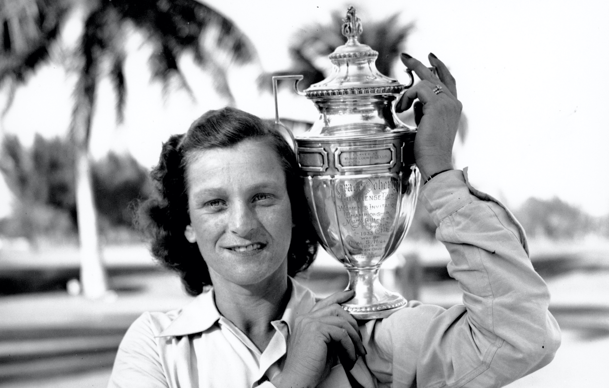 Babe Didrikson Zaharias poses with her trophy at the Miami Biltmore Country Club in Miami, Fl. on Feb. 1, 1947. Zaharias was presented the challenge cup for winning the Helen Lee Doherty Women's Invitational Championship golf tournament. (AP Photo)